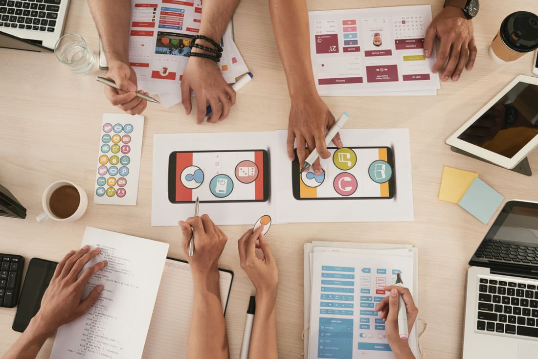 The Digitifex team collaborating on website and app designs